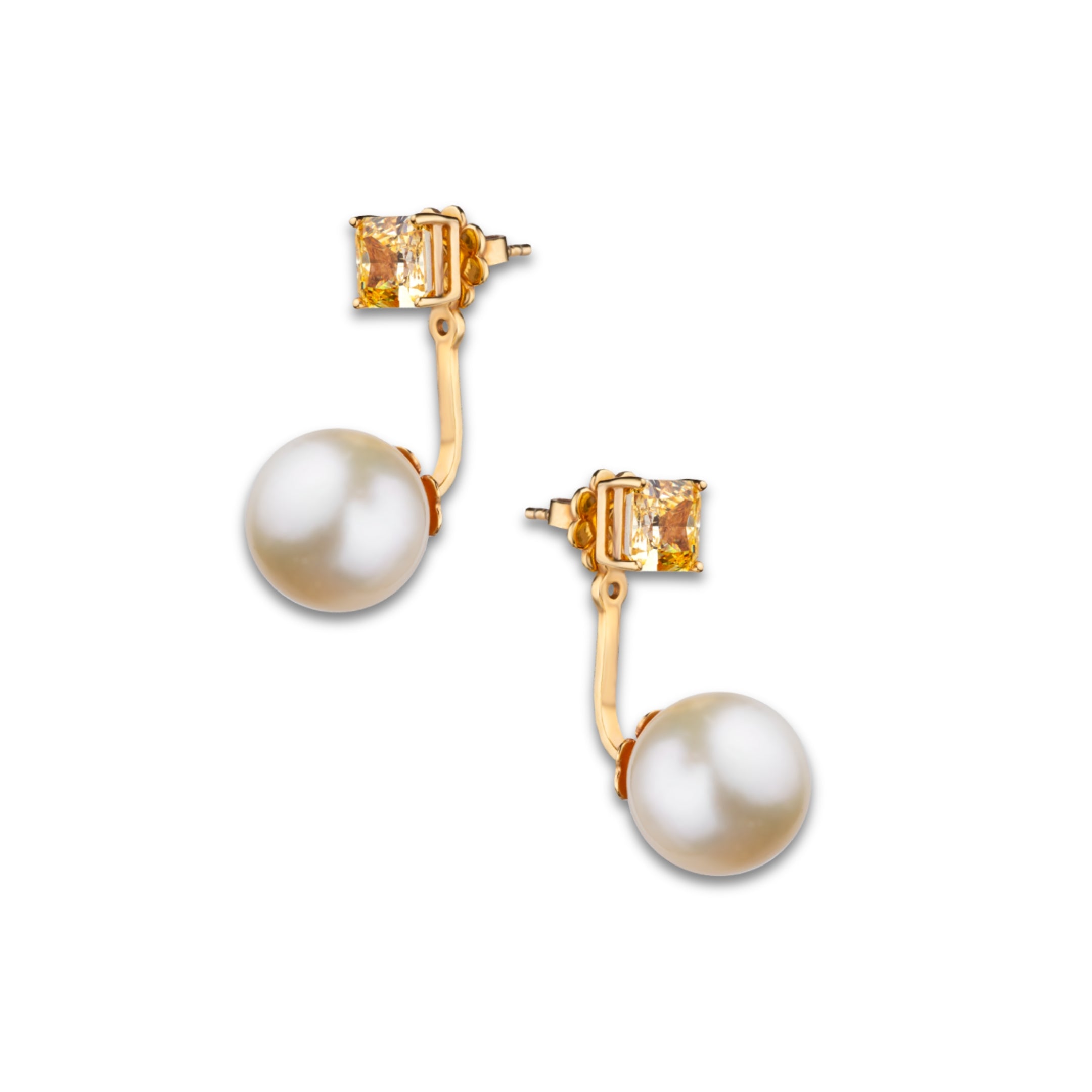 The Aurelia Earrings by Just Brilliant, crafted from 18-karat white gold weighing 14.80 grams, feature vibrant 1.5-carat citrines atop each side (totaling 3 carats) and luminous Akoya pearls suspended below, embodying timeless elegance and modern sophistication.