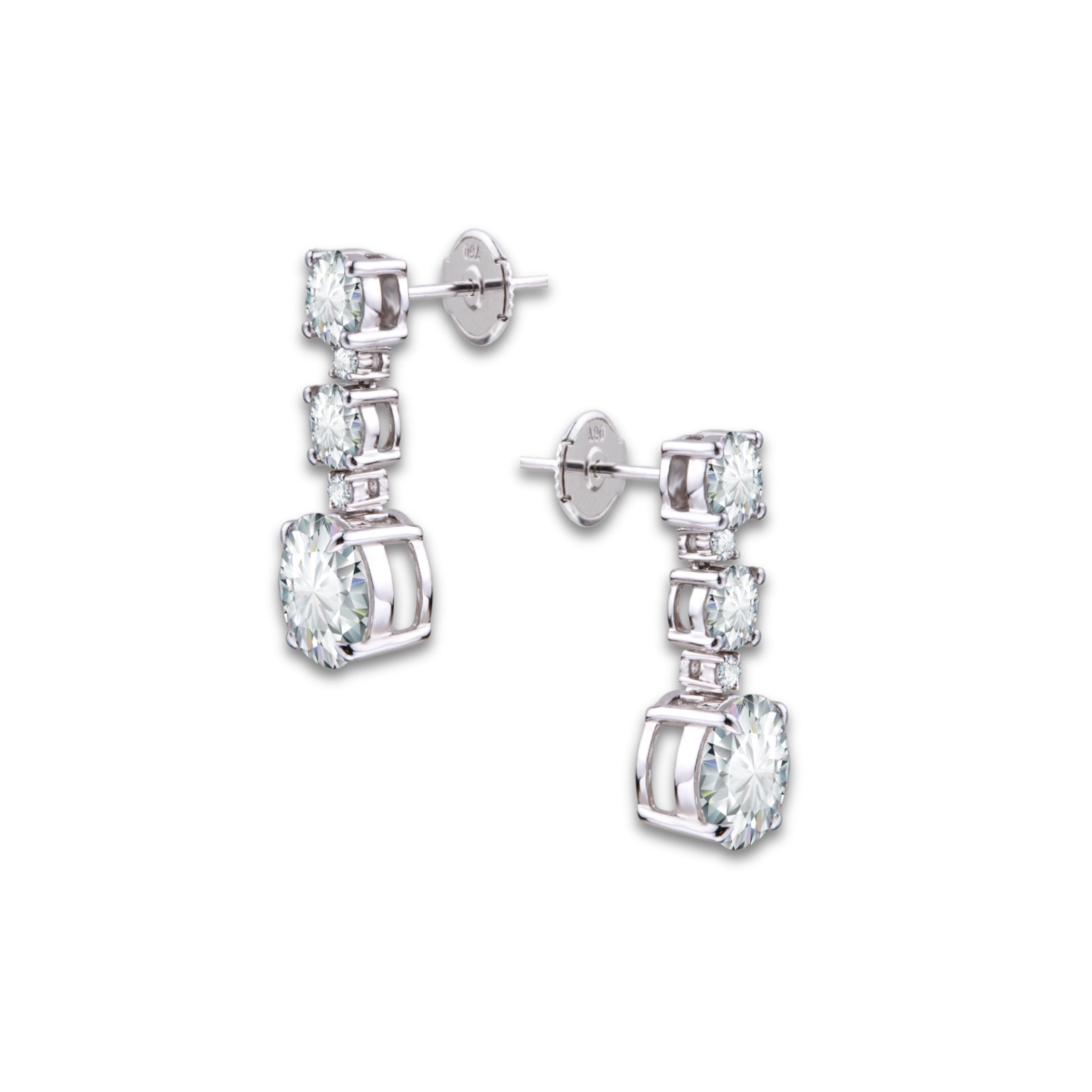 The Diamond Ladder Earrings by Just Brilliant – Crafted in 18-karat white gold, these earrings feature six solitaire diamonds totaling 6.30 carats. The graduated design, reminiscent of a ladder, offers a striking fusion of modern sophistication and timeless elegance, creating a brilliant ascent of light and sparkle.
