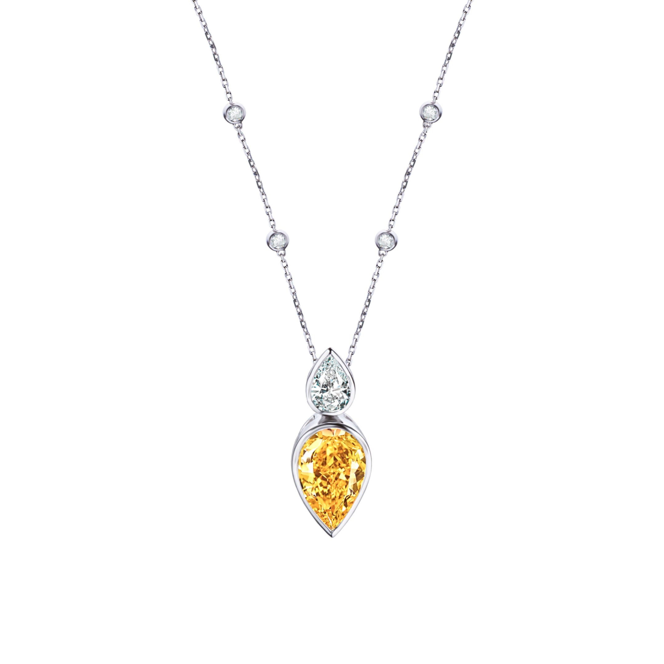 The Solar Harmony Necklace by Just Brilliant – Crafted in 18-karat white gold, this exquisite necklace features a pear-shaped lab-created diamond paired with a larger pear-shaped citrine. The radiant brilliance of the diamond contrasts with the warm, golden glow of the citrine, creating a striking harmony of light and warmth.