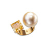 The Solar Pearl Ring by Just Brilliant, an exquisite 18-karat yellow gold creation featuring a vibrant 5.5-carat natural citrine and a luminous Japanese Akoya pearl, designed to embody elegance and timeless sophistication.